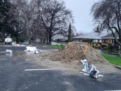 The road into the Memorial Park in Mosgiel has surface flooding and part of the sport ground looks like a lake.